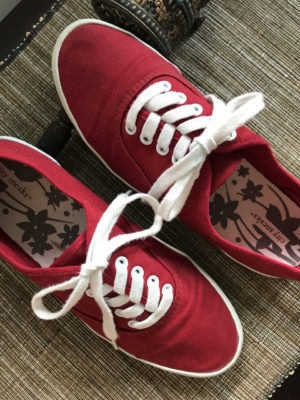 Stylish, comfortable shoes for women over 40: red sneakers