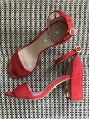 Stylish, comfortable shoes for women over 40: red suede sandals with block heels