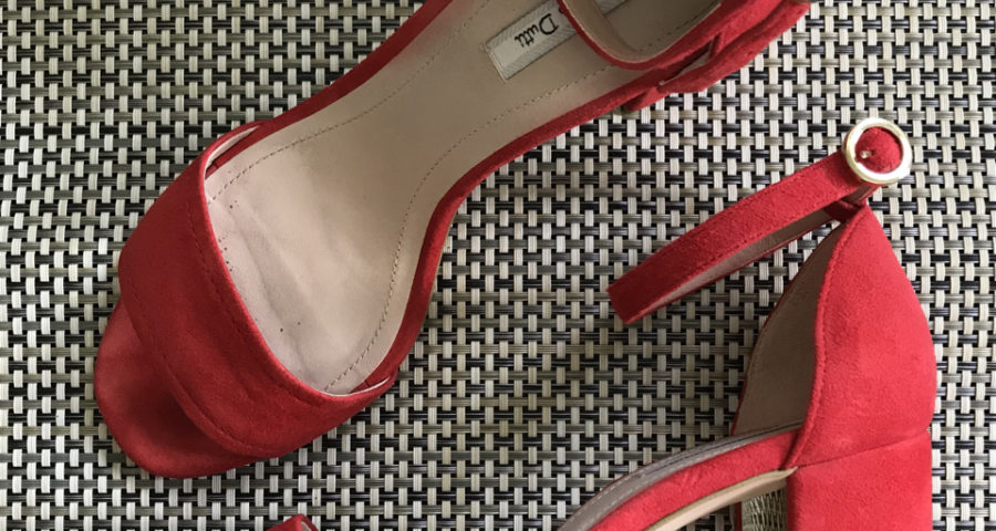 Stylish, comfortable shoes for women over 40: red suede sandals with block heels