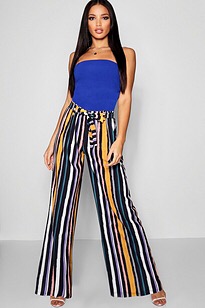 Striped palazzo pants with a bright top. the bright top brings attention to your face.