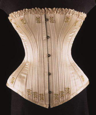 Underwear Essentials blog. Picture shows ivory silk satin and whalebone corset circa 1900