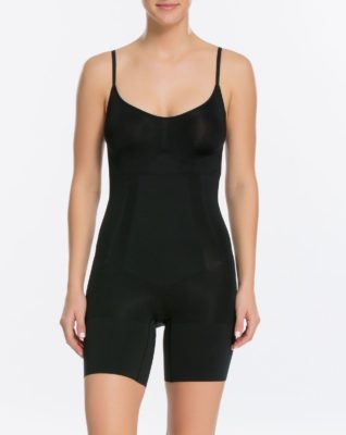 Underwear Essentials blog. Model wears a modern day version of a girdle - the OnCore mid-thigh bodysuit from Spanx.