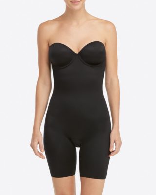 Underwear Essentials blog. Model wears a modern day girdle: the Strapless cropped mid-thigh bodysuit by Spanx.