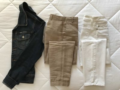 Choosing neutral coloured pants and a jacket are the first step in a travel packing capsule wardrobe.