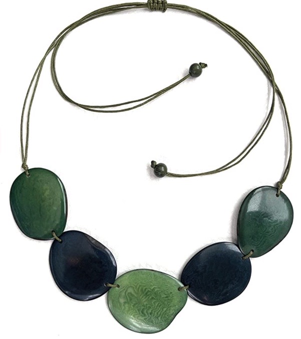 Green necklace made from Tagua nuts. It features five large organic shaped beads.