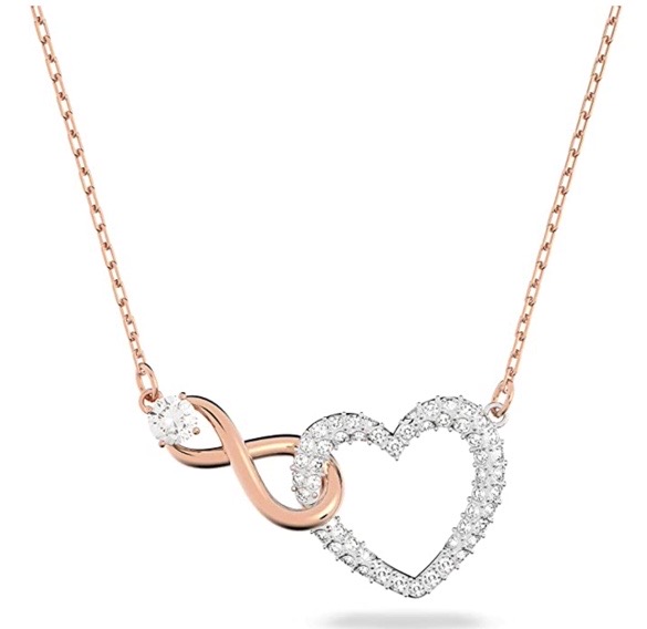 Swarovski Infinity Heart necklace featuring a white crystal heart intertwined with a rose gold plated infinity symbol.