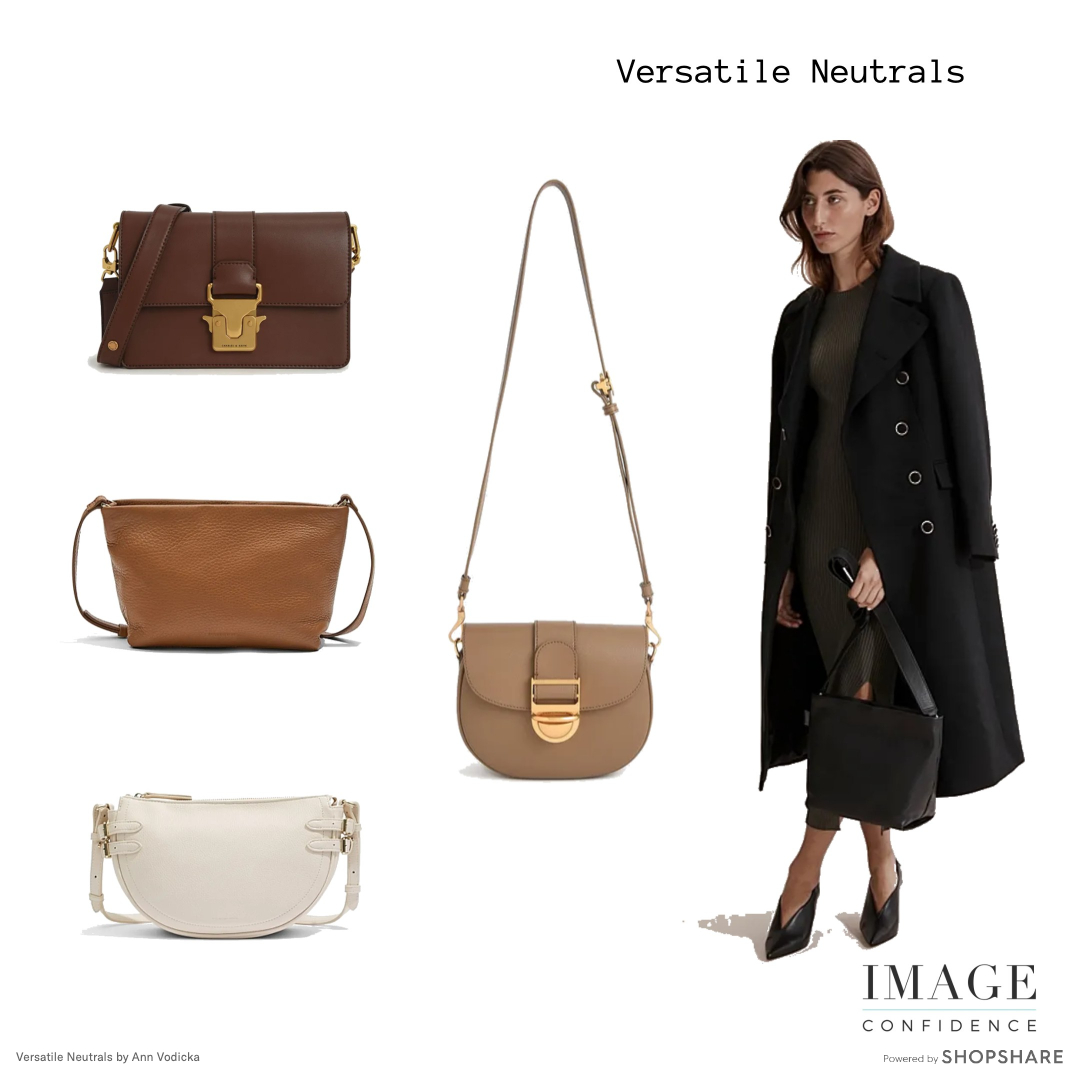 A model wearing a black coat holds a black handbag. There are four handbags on the left hand side of the image. They are brown, tan, soft white and beige in colour.