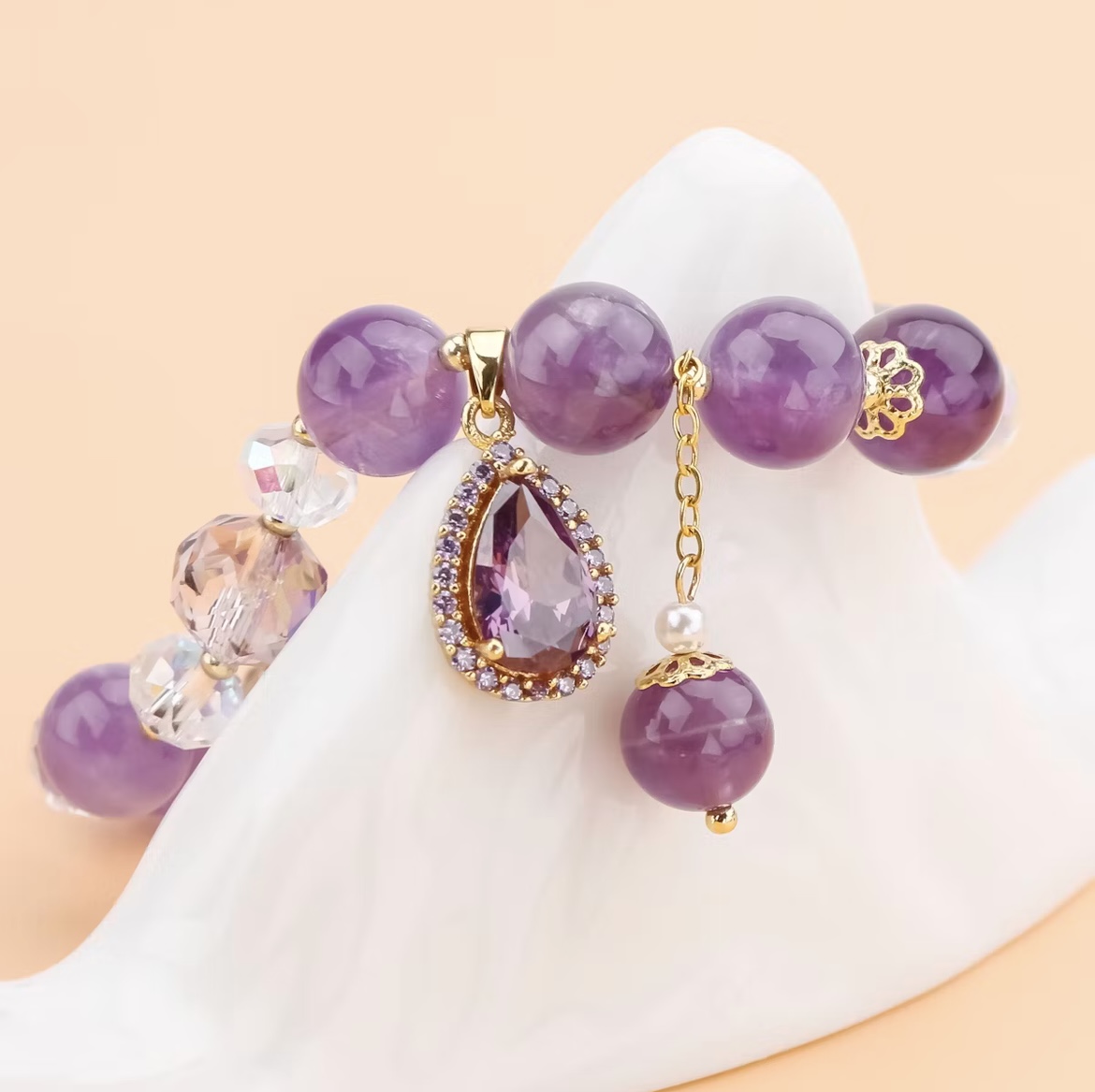 Amethyst bracelet highlighting one of the best jewellery colours for cool skin tones.